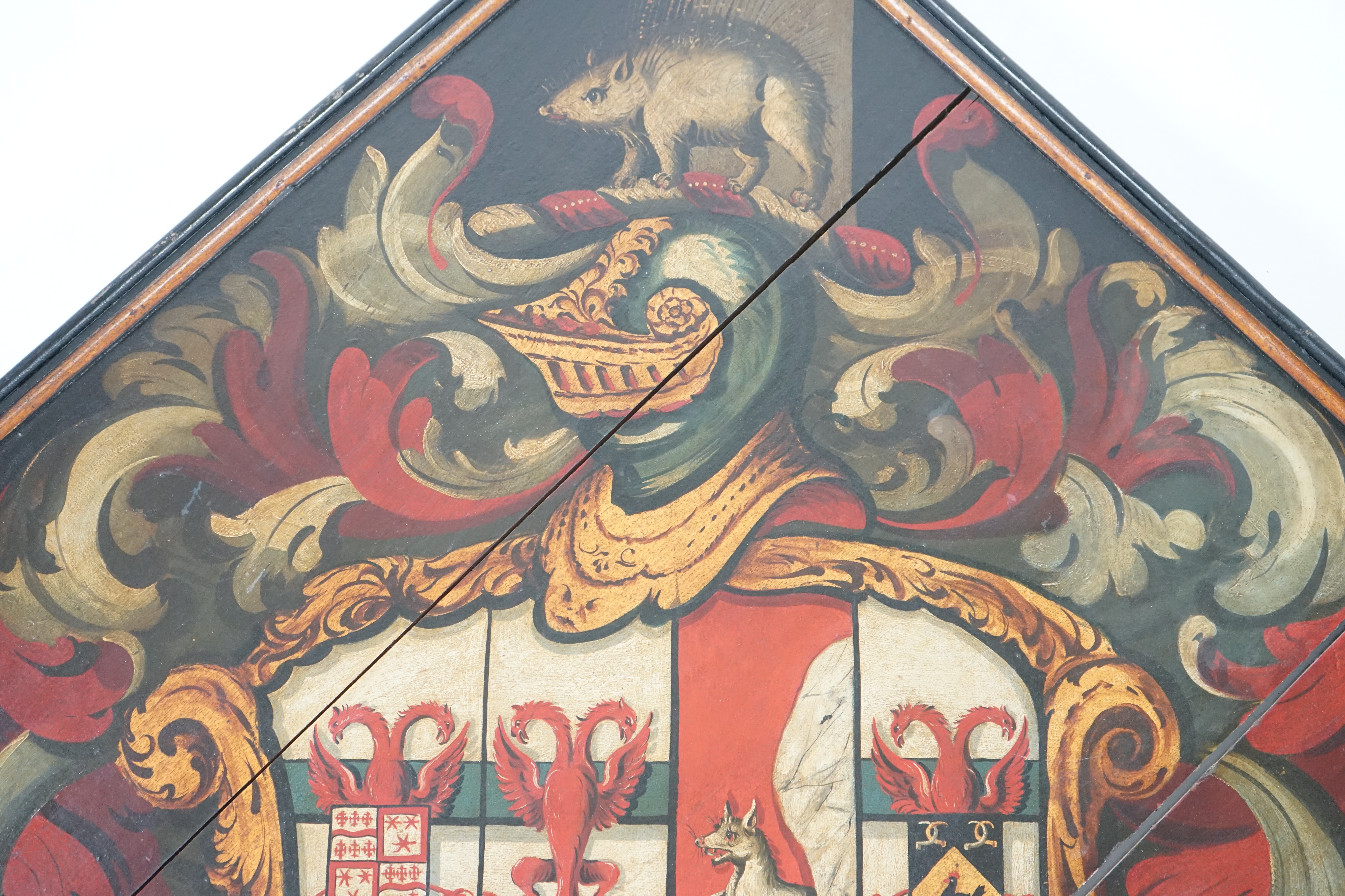 A late 18th / early 19th century oil on wooden panel hatchment